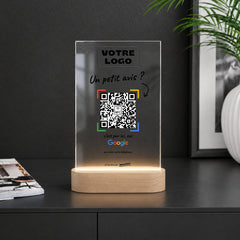 Plaque avis LED personnalisée sur un comptoir noir