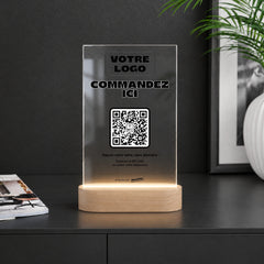 Plaque menu personnalisée LED sur un comptoir noir