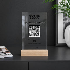 Plaque rendez-vous personnalisée en acrylique sur un comptoir noir